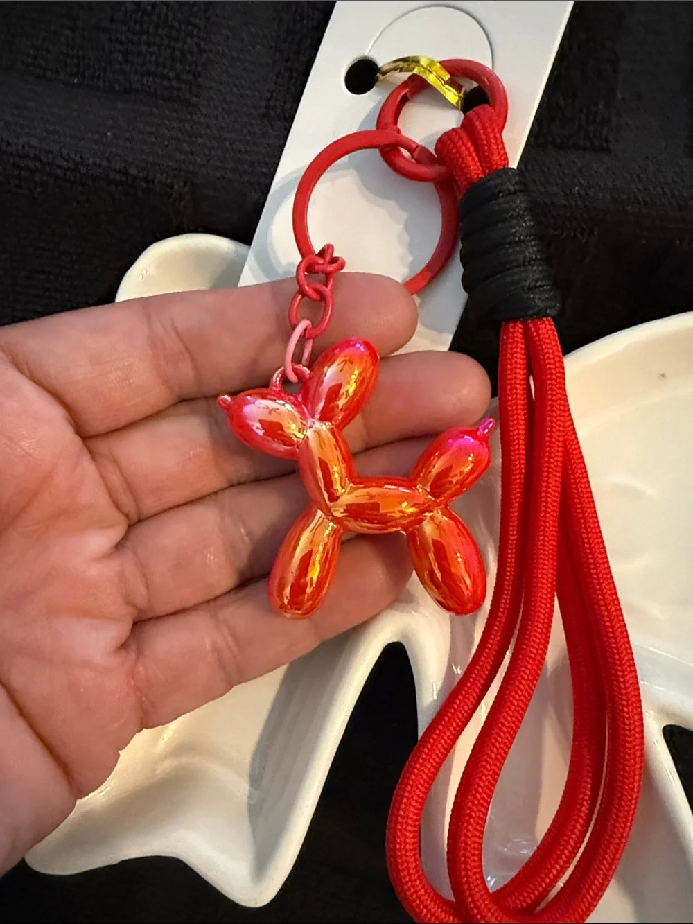 Mint Red Tassel Keychain with Iridescent Orange-Pink Balloon Dog Charm
